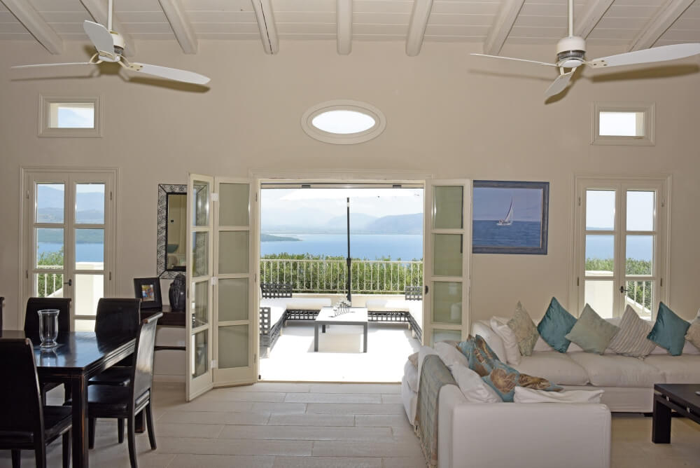 Sun-drenched terrace at Villa Eremia with uninterrupted sea views over the North-East Corfu coast